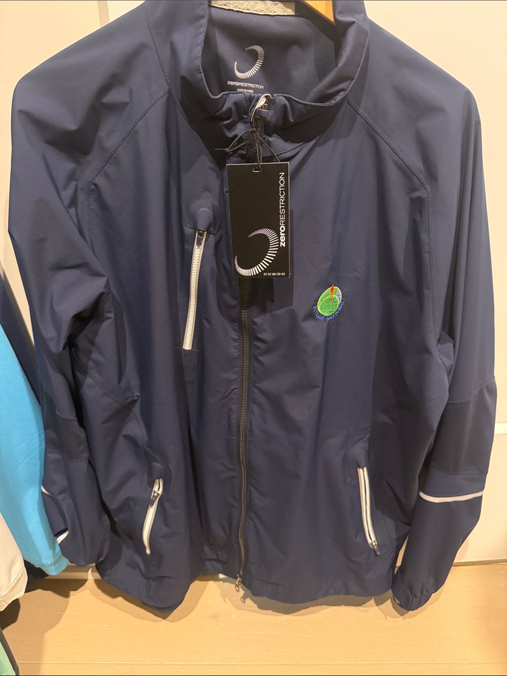 ZERO RESTRICTION butler national golf  Navy Lightweight Water-Resistant Jacket